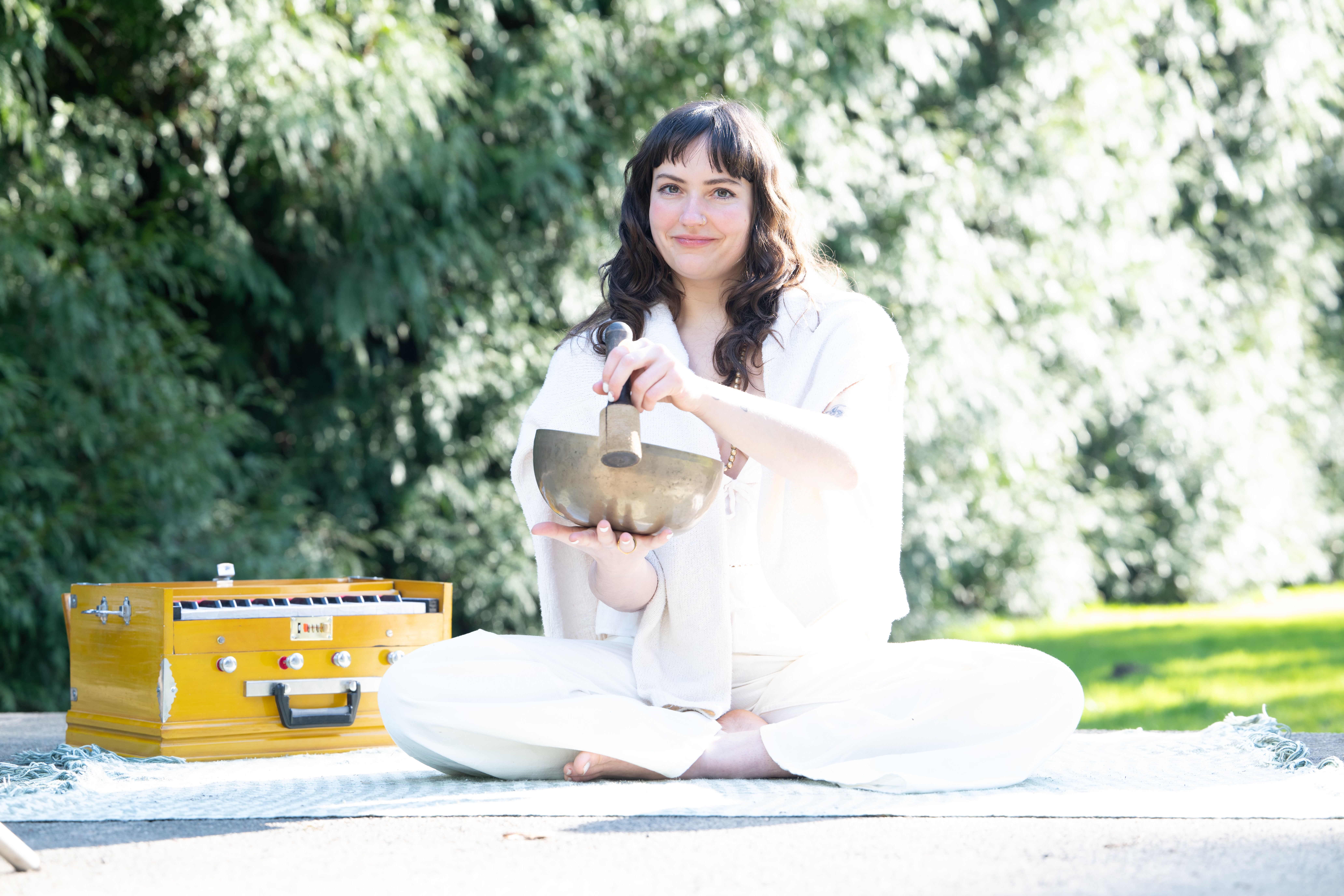 Quincee Lark with singing bowl